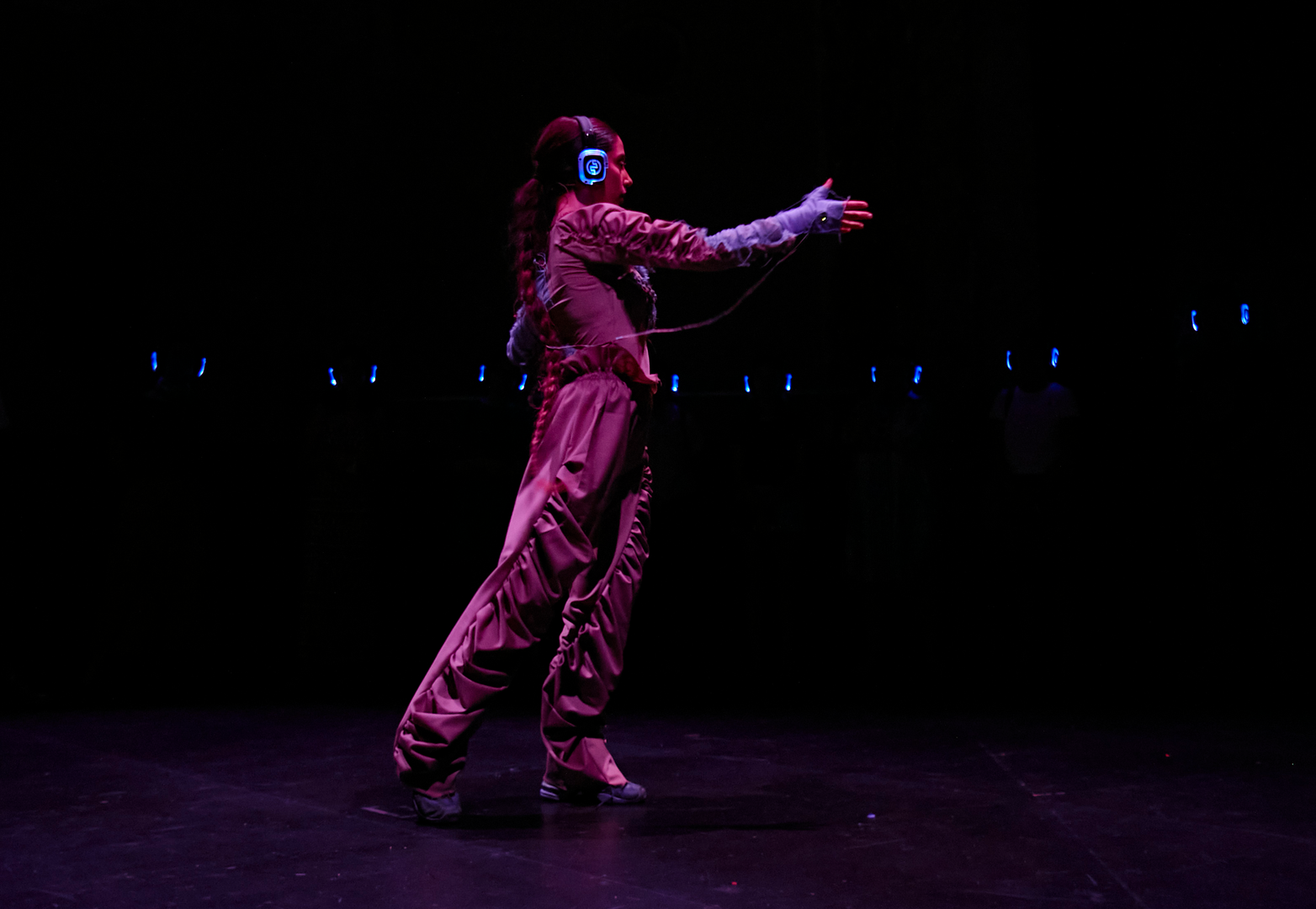 Performer generating the live soundscape using motionsensors